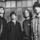 R.E.M. in 1996: Peter Buck, Bill Berry, Mike Mills, and Michael Stipe